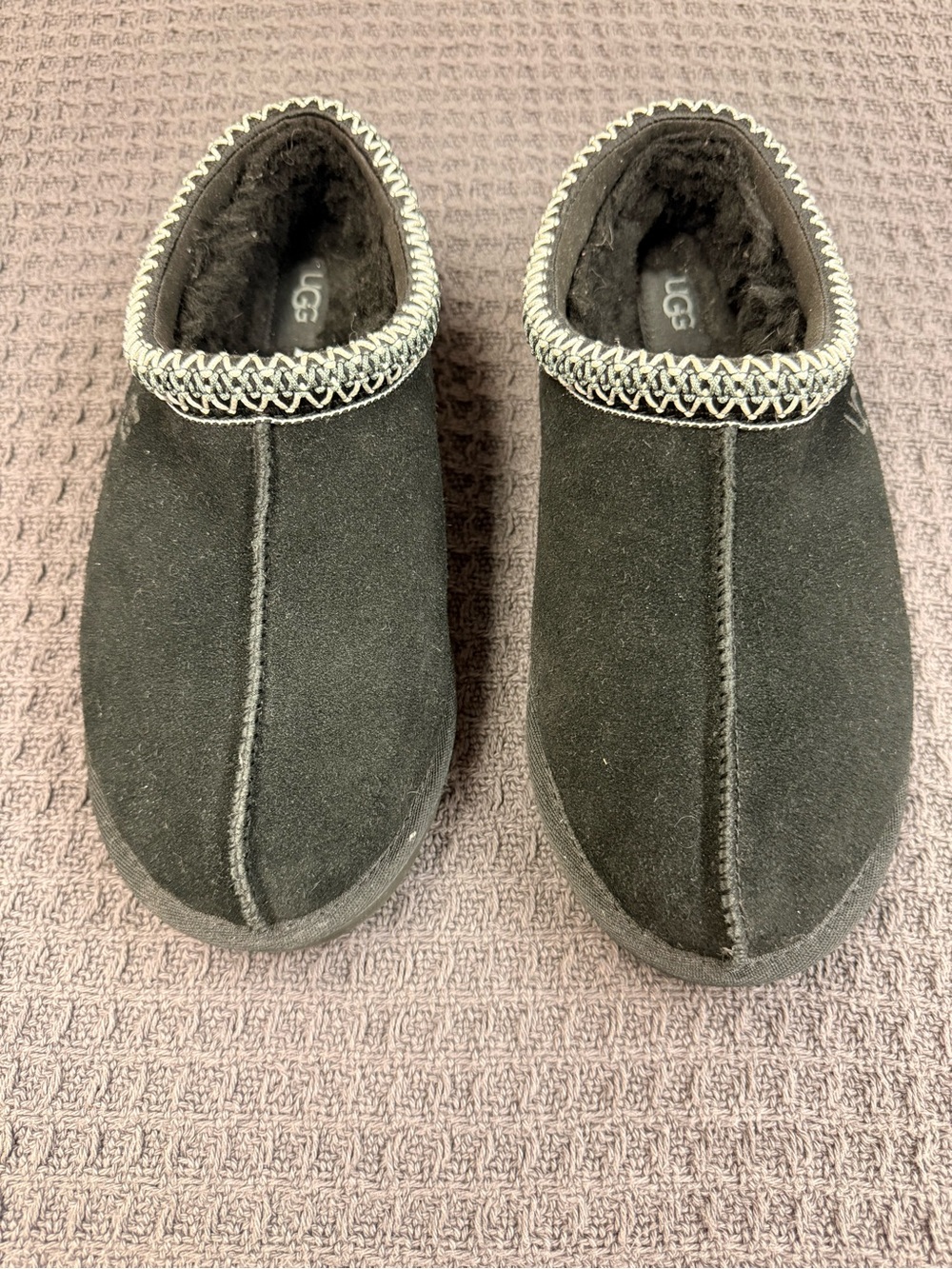 UGG Tasman Black Suede Sheepskin-Lined Slip-Ons with Contrast Trim